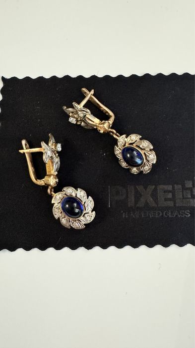 Продам золотые серьги
