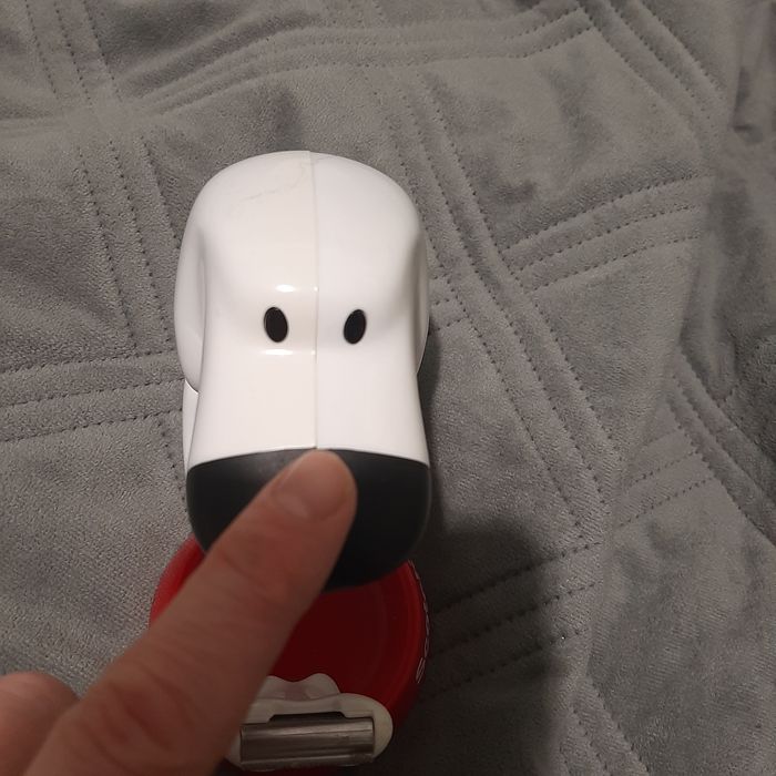 Podajnik na taśmę klejącą piesek