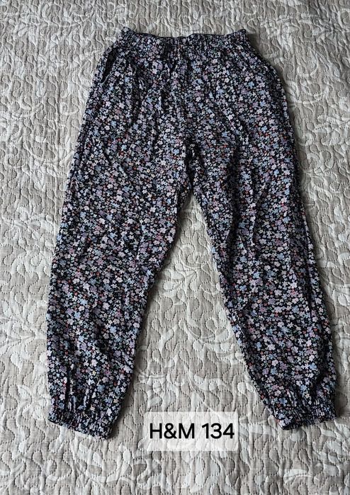 Haremki w kwiatki dla dziewczynki firmy H&M rozmiar 134 stan bdb