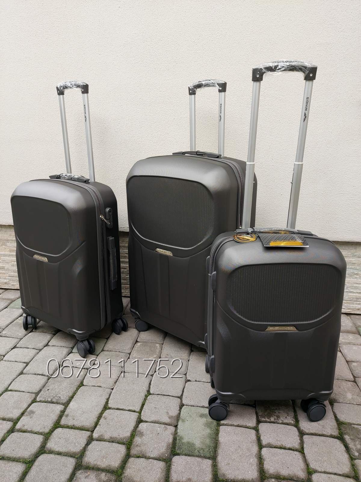 На подвійних колесах WINGS PDT01 Польща валізи чемоданы сумки на колес