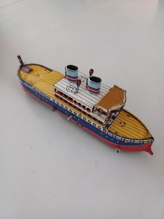 Barco brinquedo de folha antigo