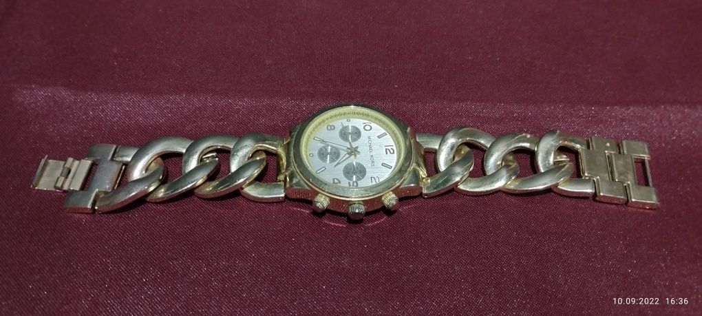 Годинник жіночих Michael Kors плетений браслет в золотистому кольорі