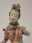 Figura japonesa em porcelana