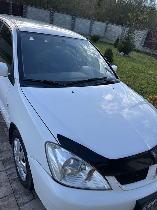 Ціну знижено! Продається надійний сімейний автомобіль Мітсубісі Ланцер