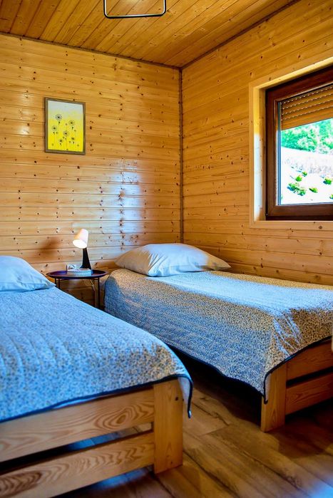 Domek z jacuzzi sauną nad jeziorem  w Bieszczadach własna plaża 30%