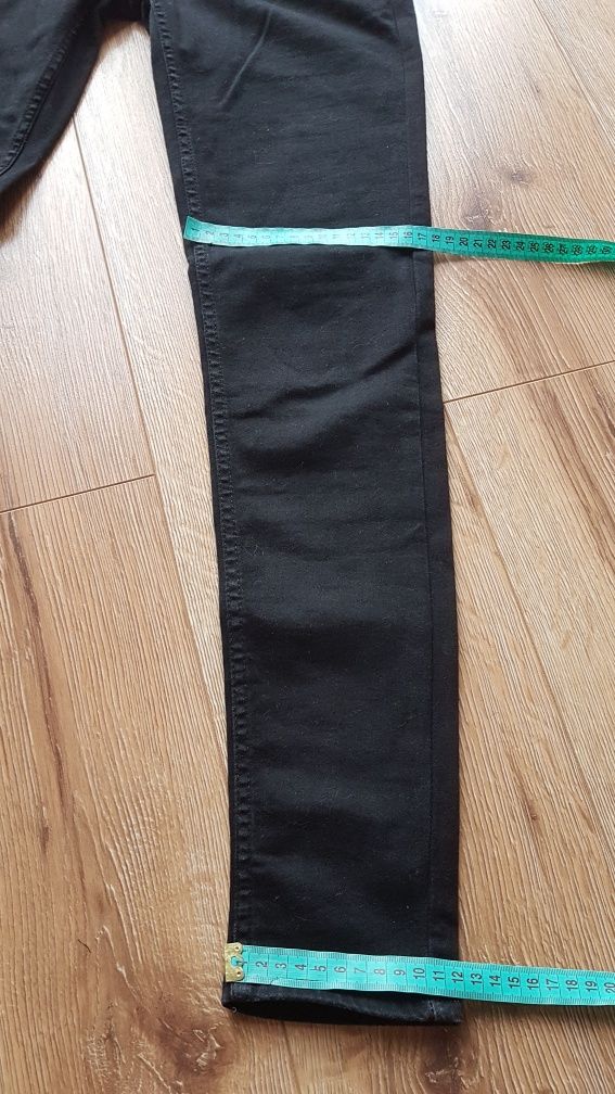 Levi's 710 super skinny jeansy spodnie damskie dżinsy czarne W27 L30