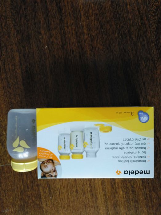 Bomba tira leite manual  e cx de 3 frascos da medela