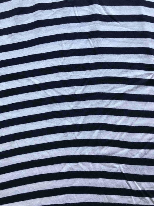 długa letnia sukienka w pasy marki Reserved w rozmiarze XS