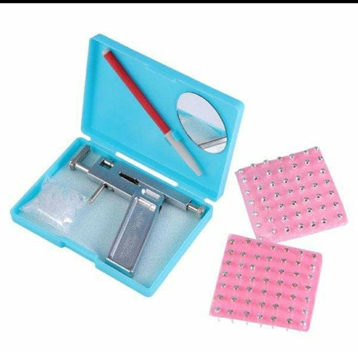 Conjunto piercing pistola novo