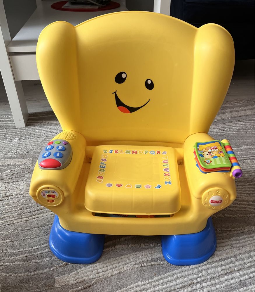 Sprzedam fotel fisher price żółty