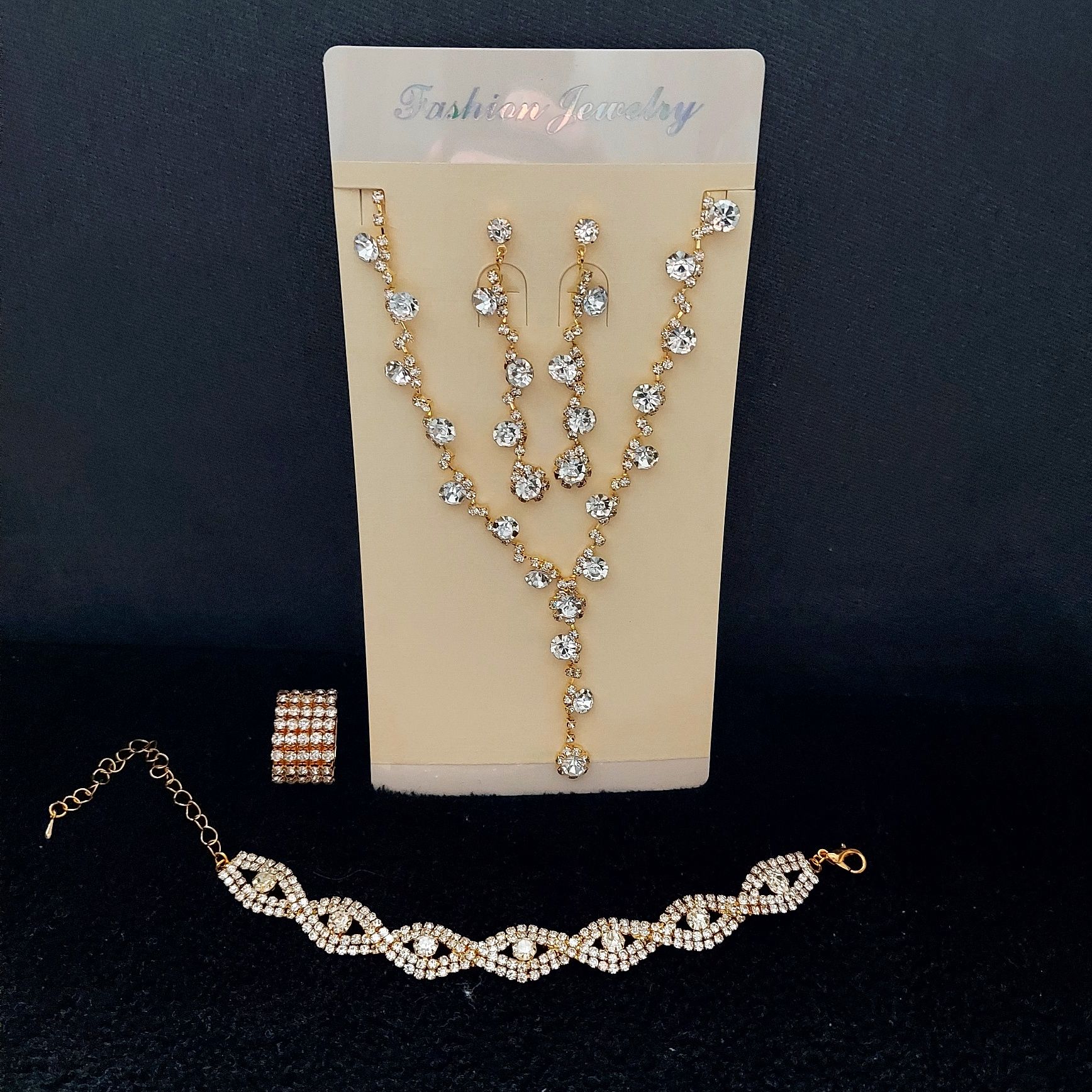 Zestaw biżuteri złotej ze srebrnymi cyrkoniami i kryształkami