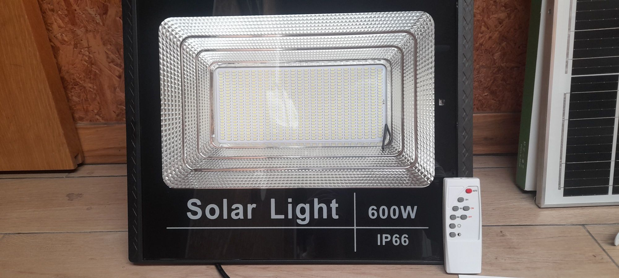 Holofote com painel solar a parte 600w e comando