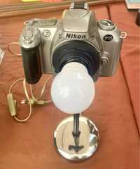 Candeeiros camera Nikon e maquina de filmar