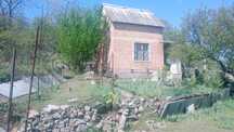 Продам дачный участок с жилым домиком