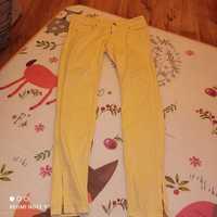 Żółte spodnie jeansowe 36
