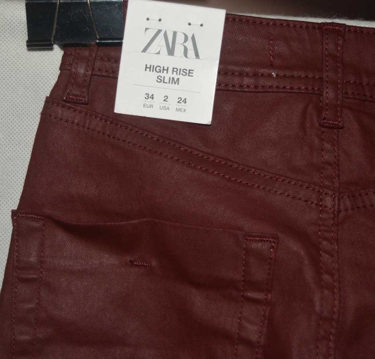 Woskowane jeansy Zara 34