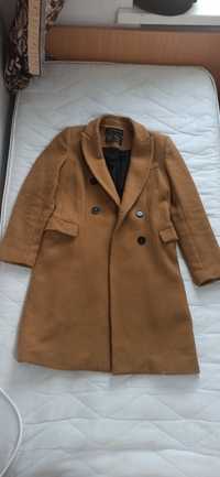 Зимова куртка коричневого кольору