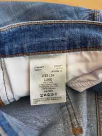 Lee LUKE stretch W33 L34 spodnie jeansy slim skinny rurki 33/34 BDB