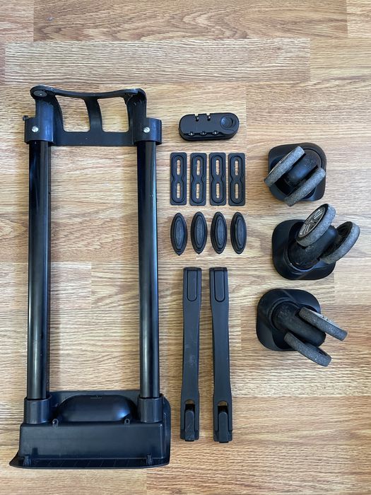 Колеса до валізи Oulando. Ручки, замок, деталі