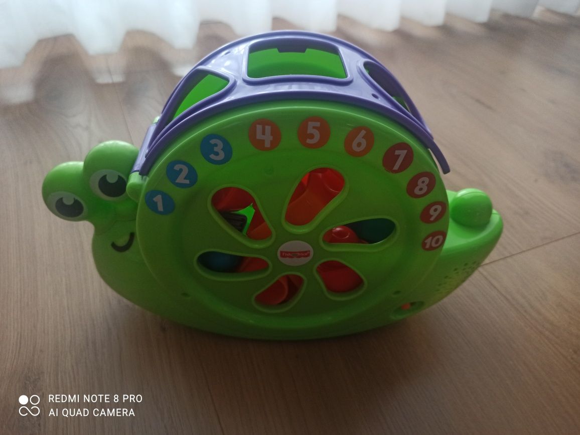 Fisher Price Śpiewający Ślimak Sorter kształtów FRC19