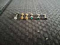 Piercings de aço para orelha novos