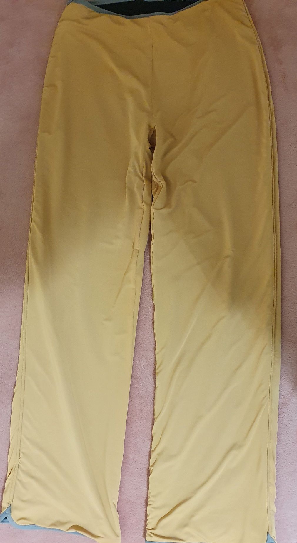 Reebok  dwu stronne spodnie dresowe  XL