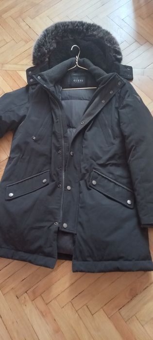 Брендовий пуховик..GUSS...50-52 р .ціна 2т.500гр.