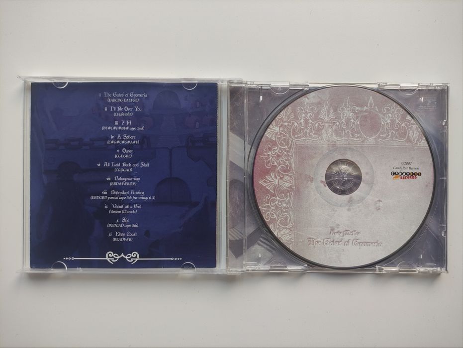 Andy McKee- The Gates of Gnomeria- CD AUTOGRAFADO