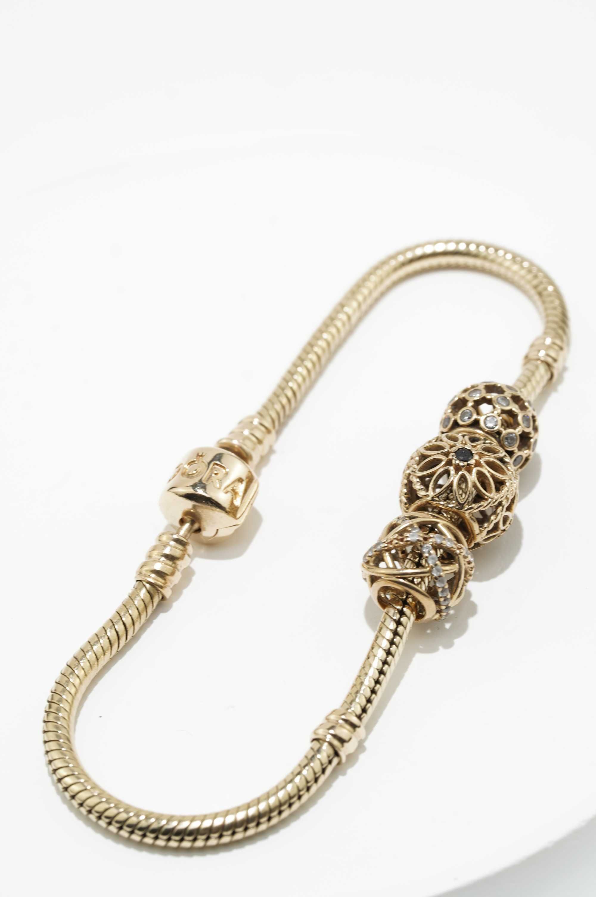 Złota bransoletka Pandora 14K 22,65g