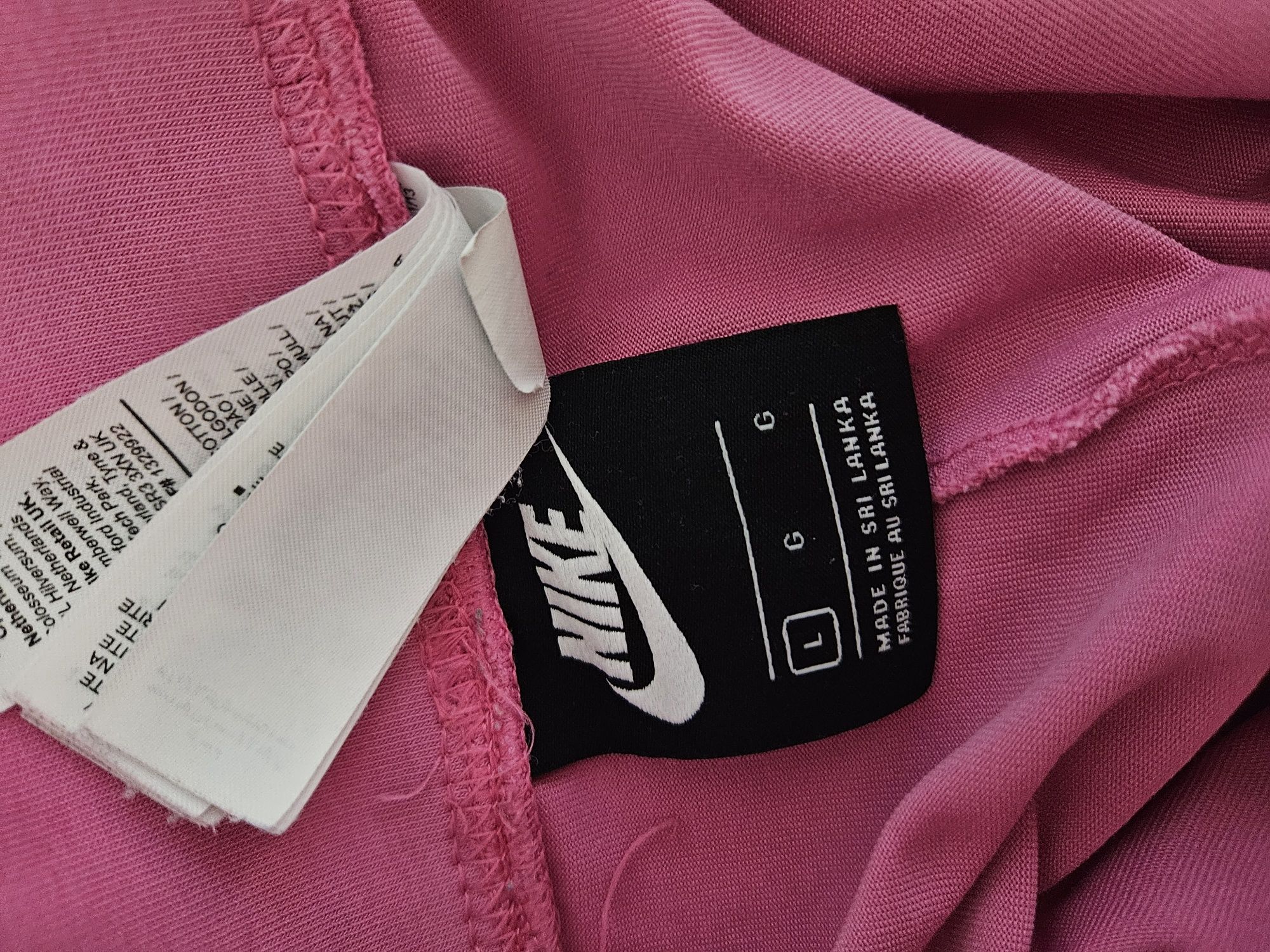 Leginsy różowe Nike rozm L