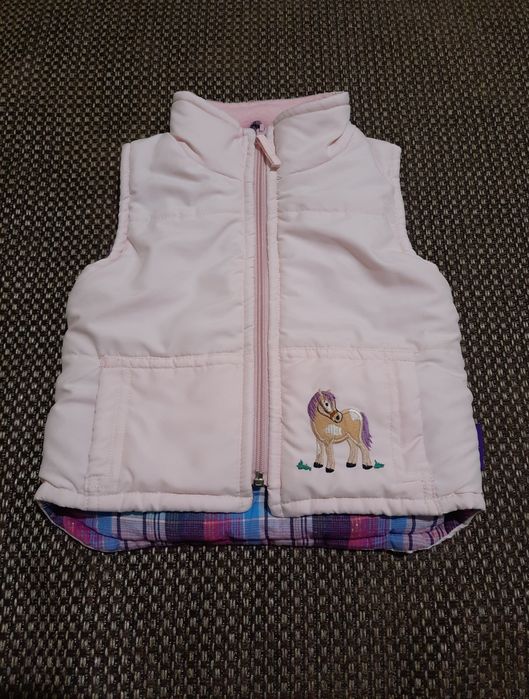 Жилетку на дівчинку рожевого кольору