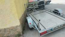 Reboque porta máquinas