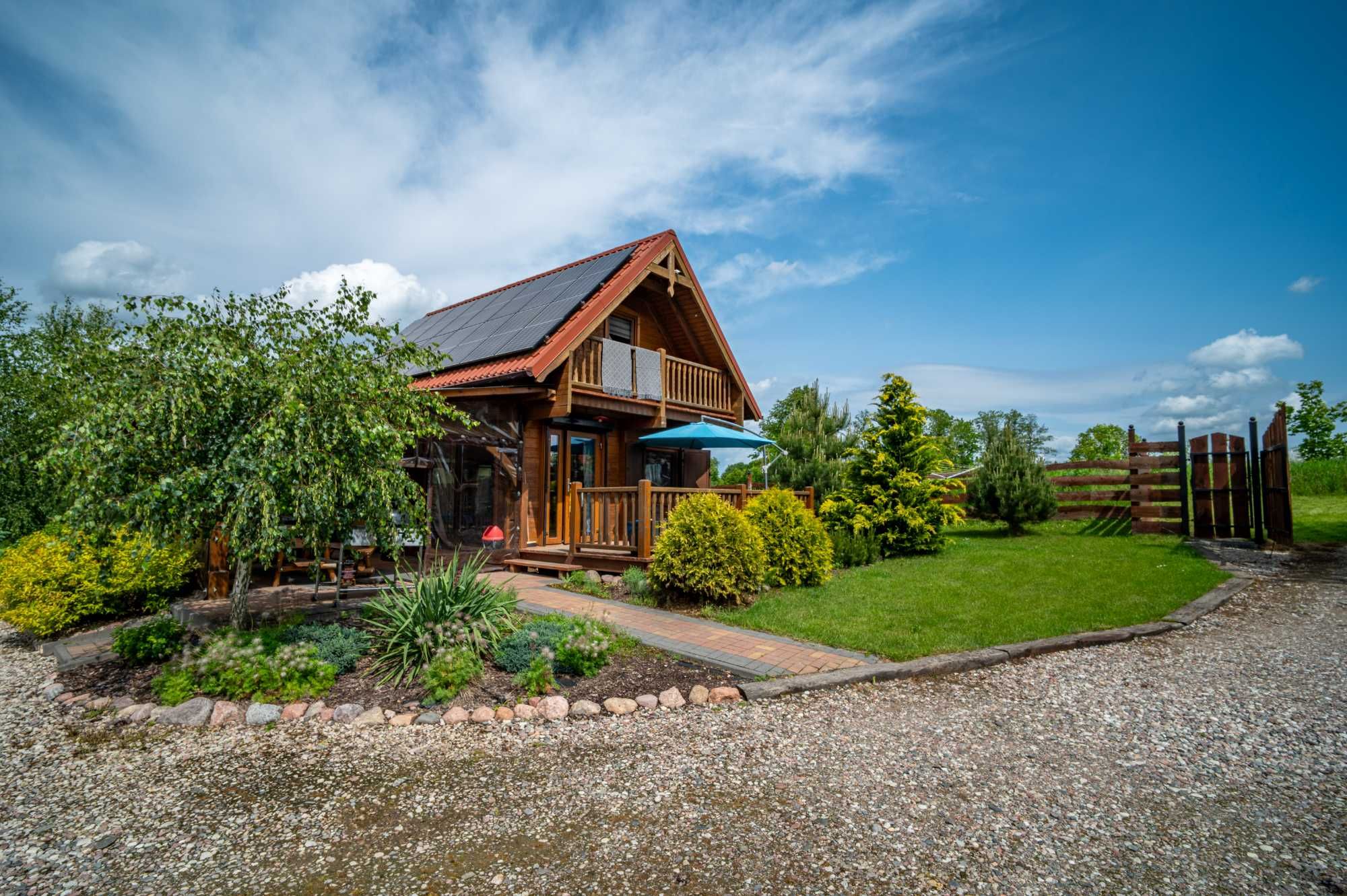 Domek 3 Mazury jacuzzi sauna łódka pomost quady