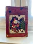 Livro de Natal para vela