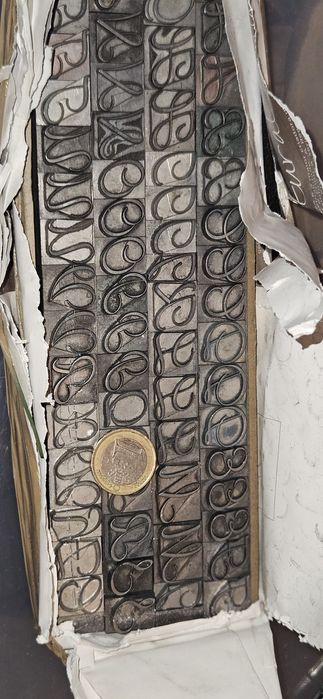 Conjunto de letras em chumbo