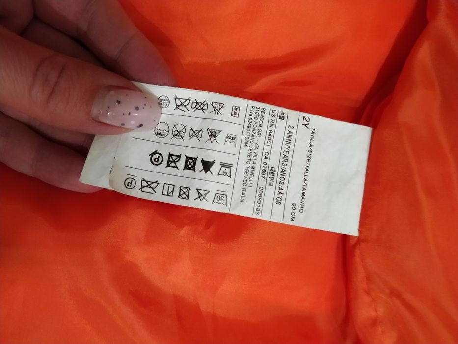 Пуховая жилетка Benetton
