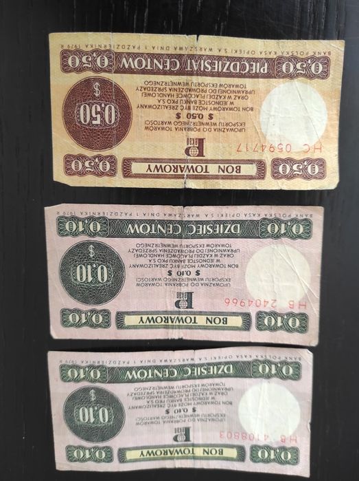 Bony towarowe dwa 10 i jeden 50 centów