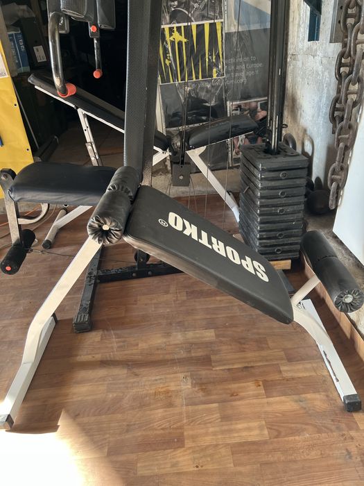 Тренажер, штанга, мішок для боксу