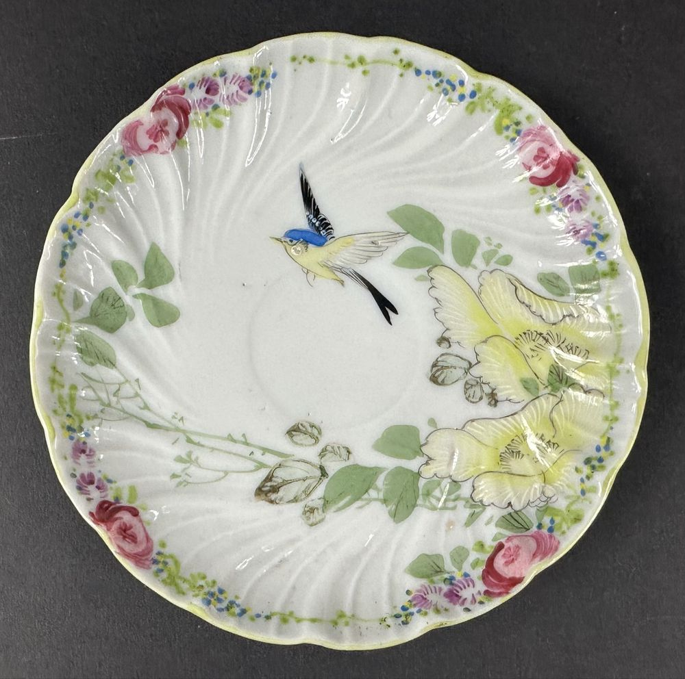 Filiżanka ze spodkiem ptak cieniutka porcelana filiżanki kwiaty