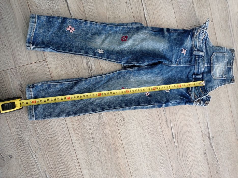 Spodnie jeansowe ogrodniczki 110