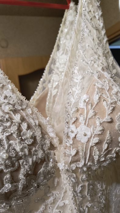 Śmietankowa suknia ślubna