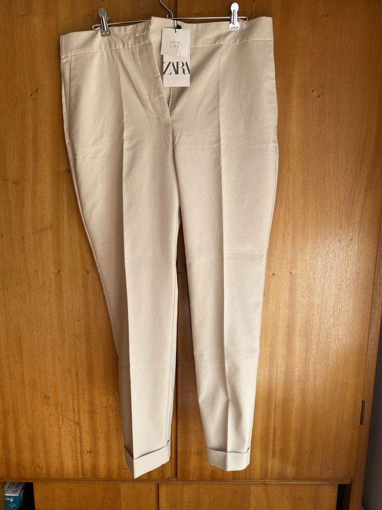 Calças creme Zara