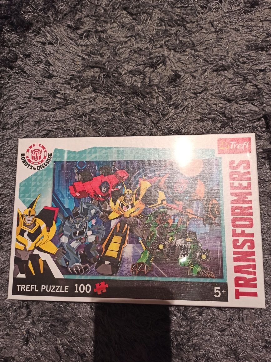 Puzzle Transformers Drużyna Autobotów Trefl 100 elementów