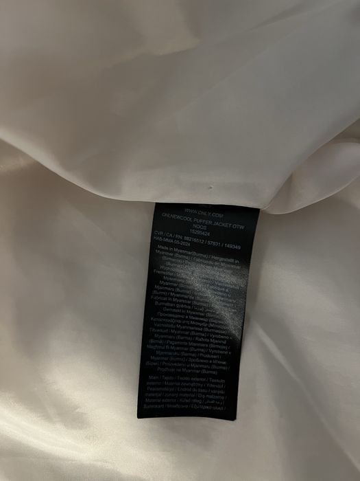 жіноча курточка,молочна