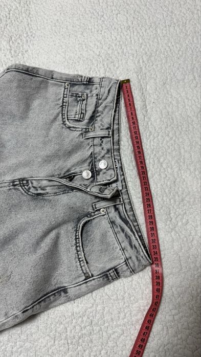 Джинси сірого кольору