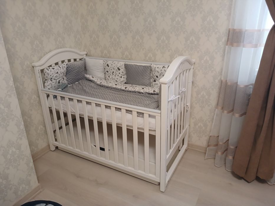 Дитяче ліжечко гойдалка