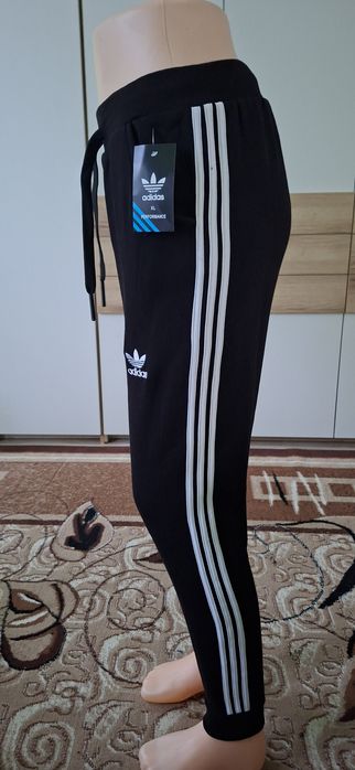 spodnie ocieplana z kieszeniami Adidas