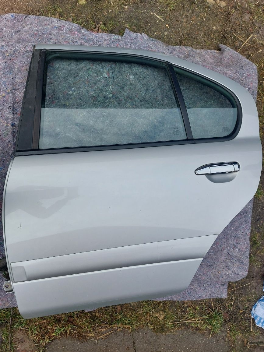 Drzwi lewe przód i tył NISSAN