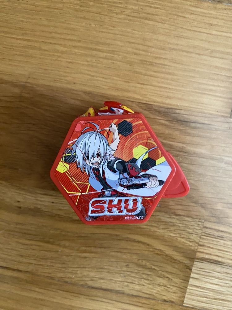Brinquedos beyblade e lançadores