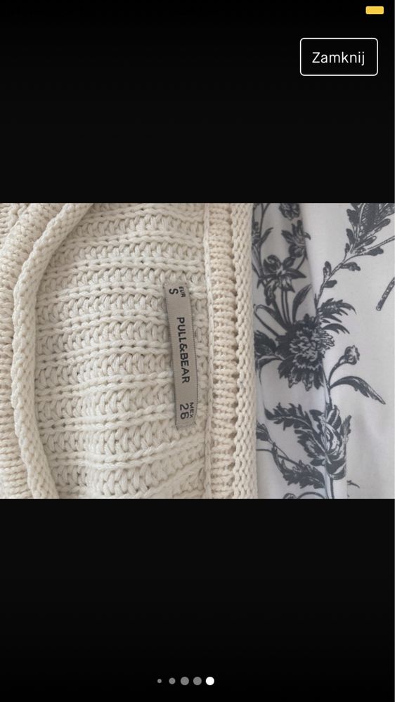 Kremowy sweterek z warkoczykowymi wzorkami